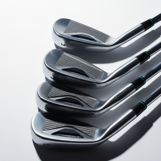 a hip image of golf club irons for a Shopify product image against a drastic white backdrop